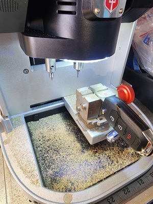Automotive key cutting machine used by locksmith in Saint Cloud